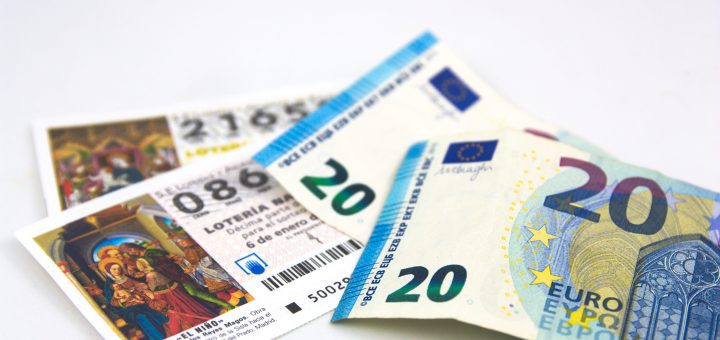 Euro banknotes (20 and 50) fanned out on a white background.